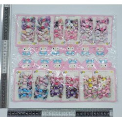 X – 038 set de 4 moños pequeños variedad de estampados my melody personajes C/12 sets K-12